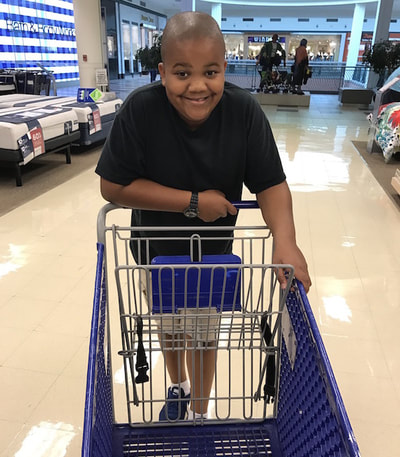 Xander Driving a Shopping Cart